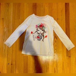 White long sleeve with girl, butterfly’s, and cat